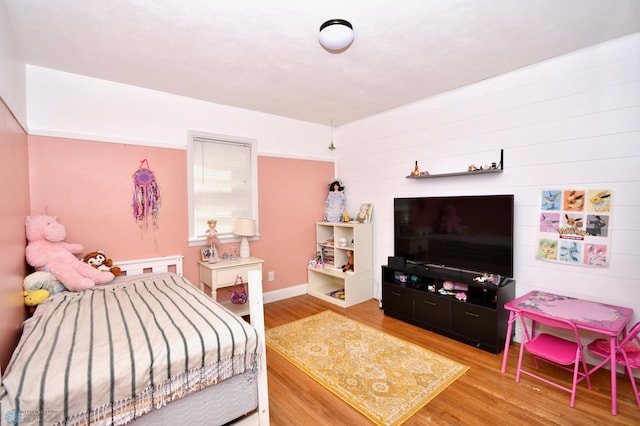 bedroom featuring hardwood / wood-style floors