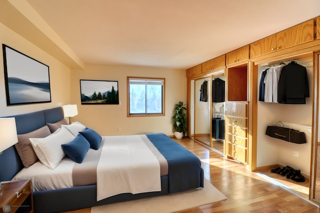 bedroom with a closet and light wood-type flooring