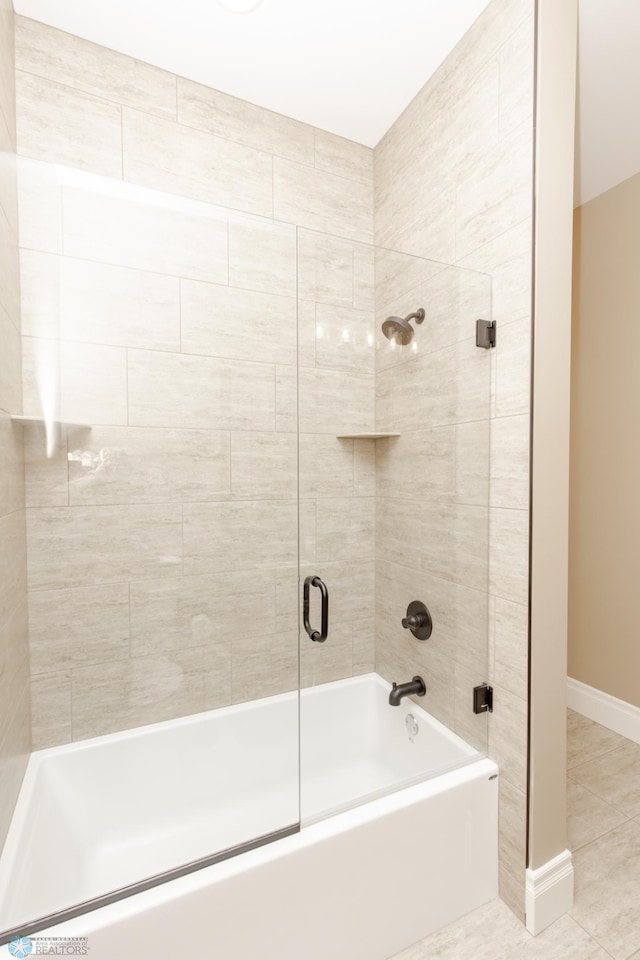 bathroom with tile patterned flooring