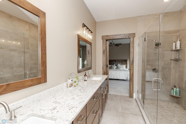 bathroom with vanity, tile patterned flooring, a shower with shower door, and ceiling fan