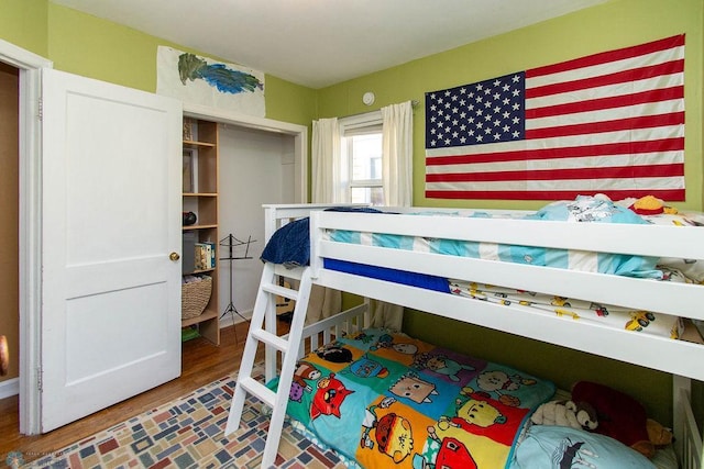 bedroom with wood-type flooring