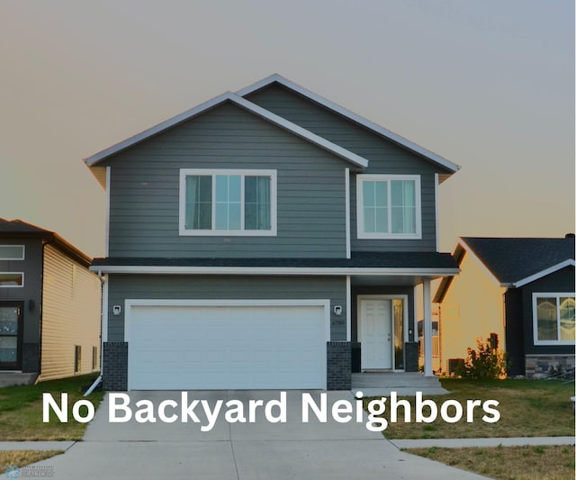 view of front of property with a garage