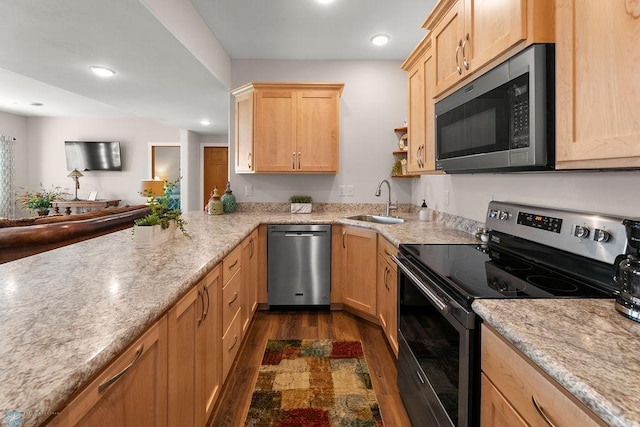 kitchen featuring light brown cabinetry, appliances with stainless steel finishes, sink, and dark hardwood / wood-style floors