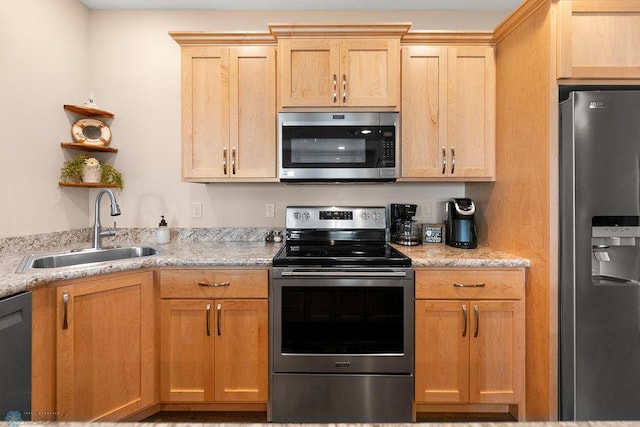 kitchen featuring sink and appliances with stainless steel finishes