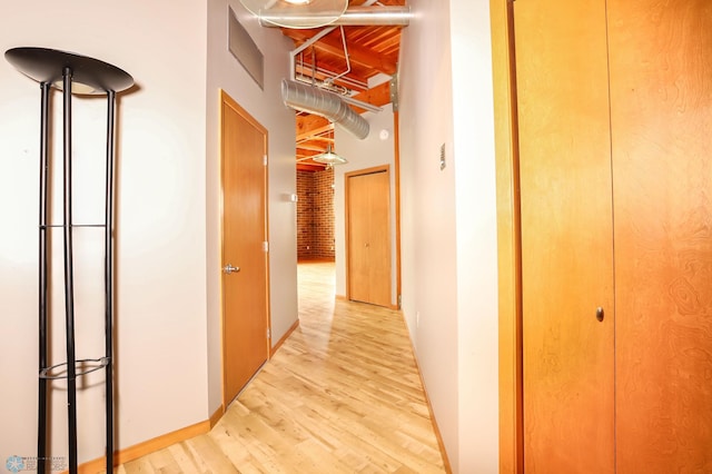 hallway featuring light wood-type flooring