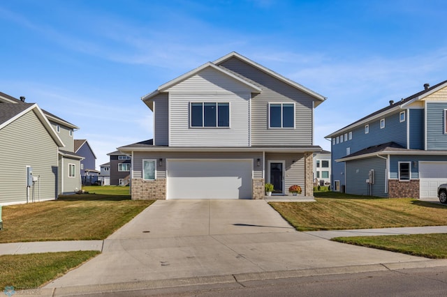 view of front property featuring a front yard and a garage