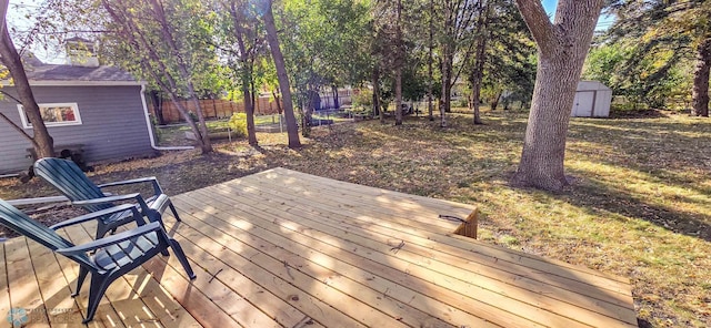 deck featuring a shed