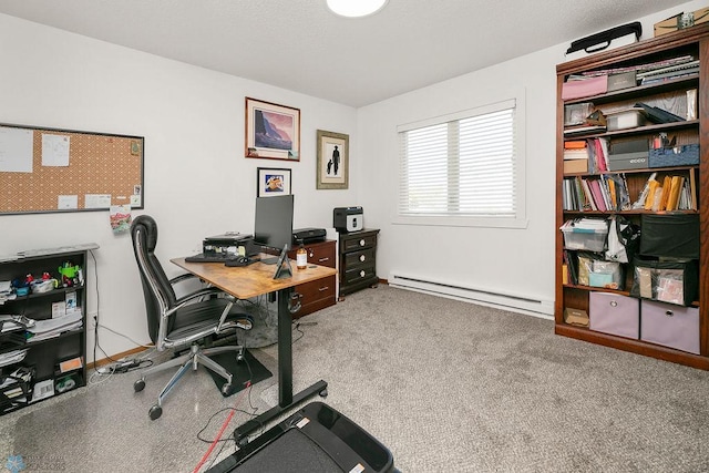 carpeted office space featuring a baseboard heating unit