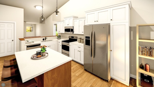 kitchen featuring kitchen peninsula, lofted ceiling, hanging light fixtures, a breakfast bar, and stainless steel appliances