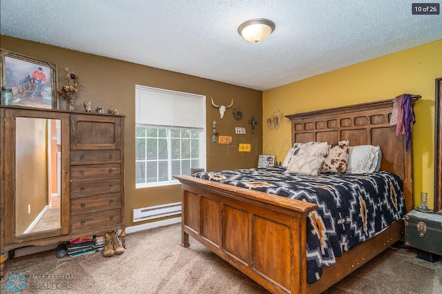 bedroom featuring a baseboard radiator, light carpet, and a textured ceiling