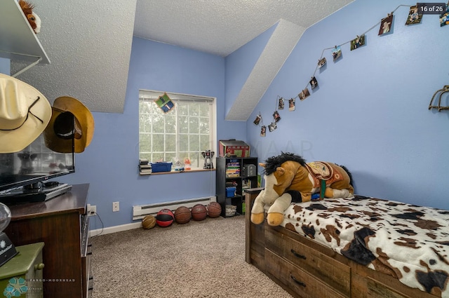 carpeted bedroom with a textured ceiling and a baseboard heating unit