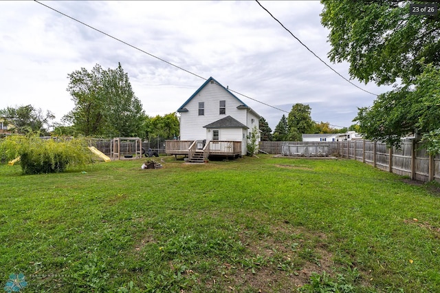 view of yard featuring a deck