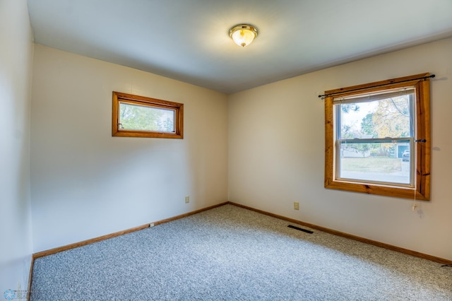 empty room with carpet floors