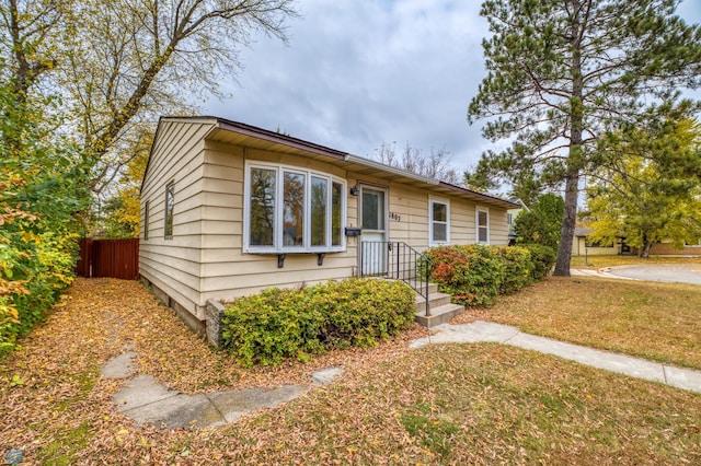 view of front of home with a front yard