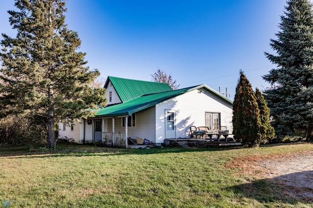 view of property exterior with a lawn