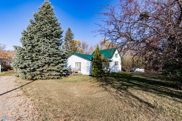 exterior space with a lawn