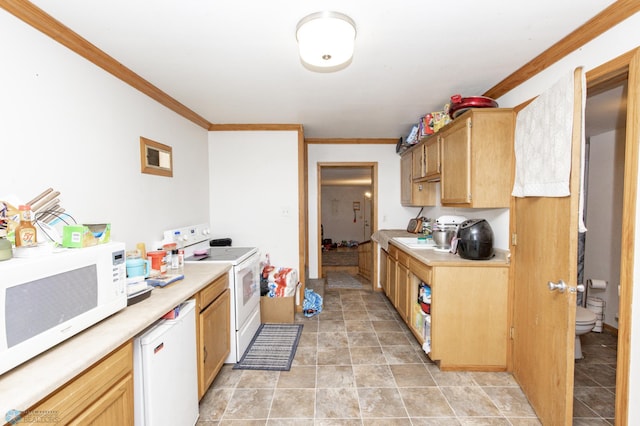 kitchen with white appliances and ornamental molding