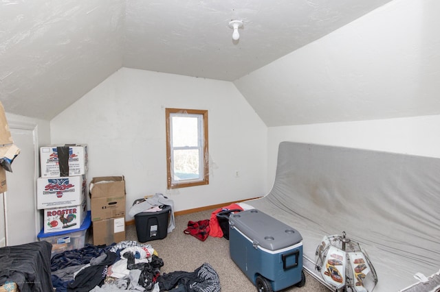 bonus room featuring lofted ceiling and carpet floors