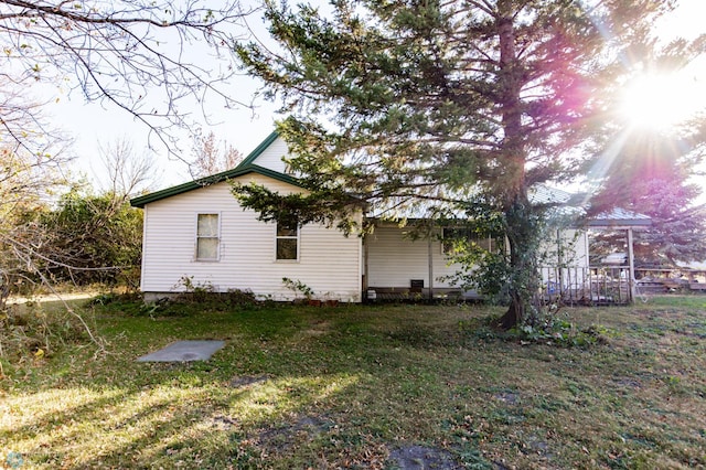 view of home's exterior featuring a yard