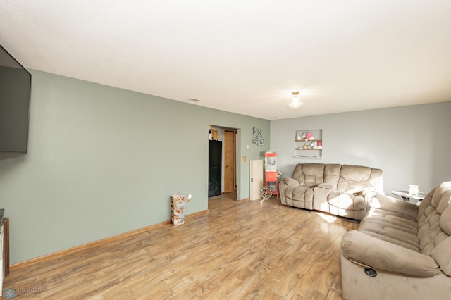 living room featuring light wood-type flooring