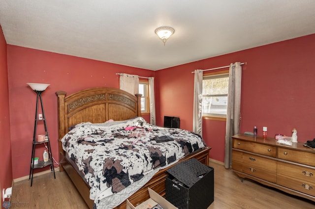 bedroom featuring light hardwood / wood-style flooring