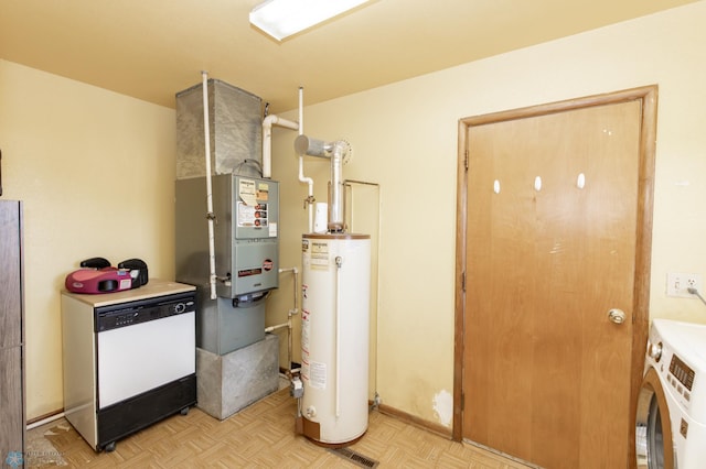 utility room featuring washer / clothes dryer and gas water heater