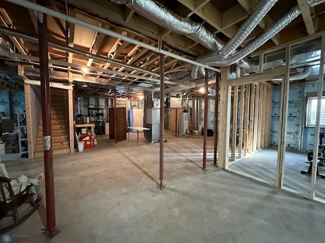 basement featuring heating unit and gas water heater