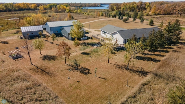 aerial view with a rural view and a water view