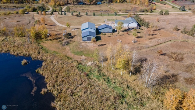 aerial view with a water view and a rural view