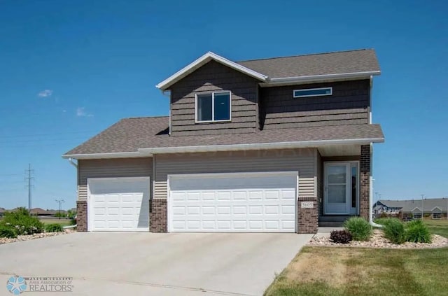 view of front of property featuring a garage