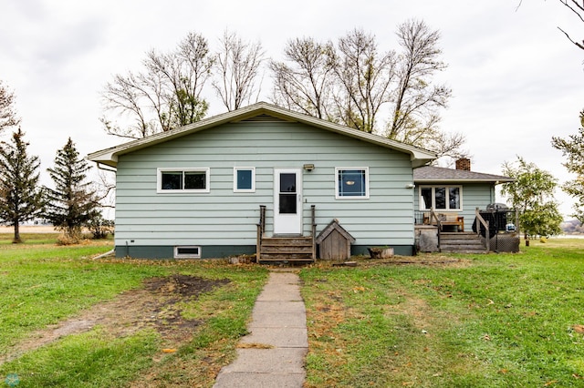 bungalow with a front yard