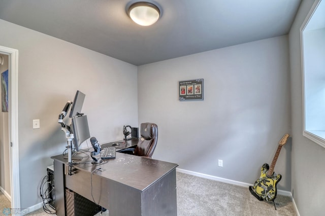 office area featuring light colored carpet