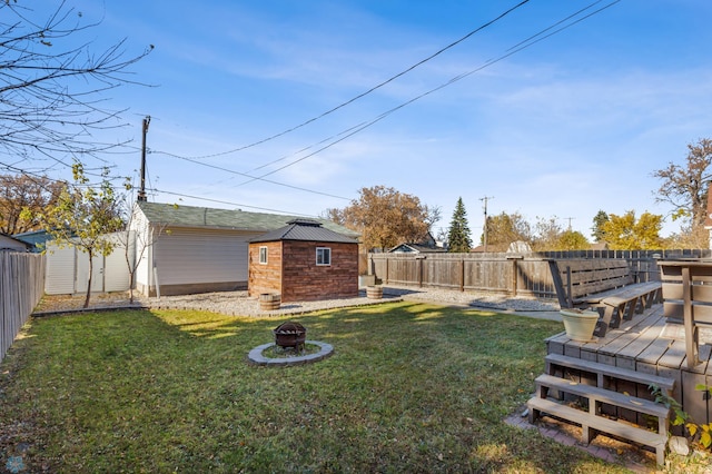 view of yard featuring a wooden deck