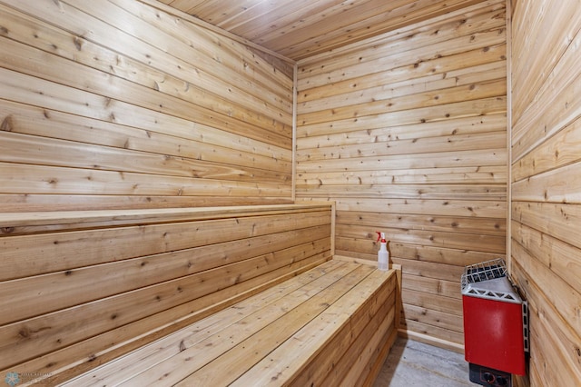 view of sauna / steam room with wood ceiling and wood walls