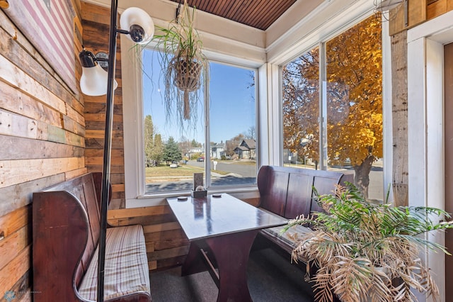 office space featuring wooden walls