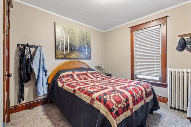 bedroom featuring carpet, crown molding, and radiator