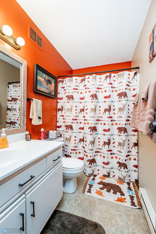 bathroom featuring vanity, walk in shower, baseboard heating, and toilet