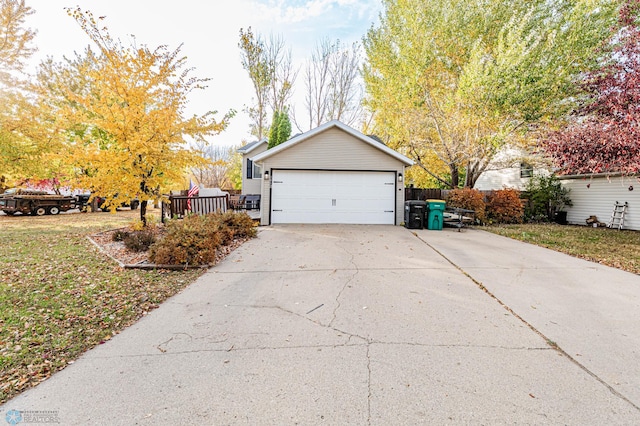 garage featuring a yard