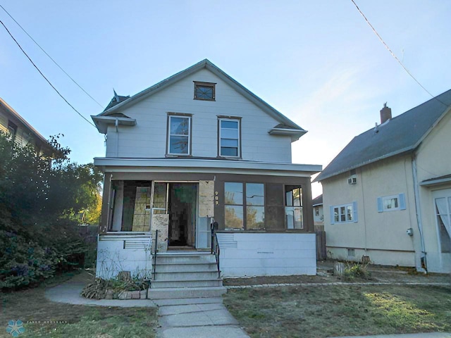 view of front of home featuring covered porch