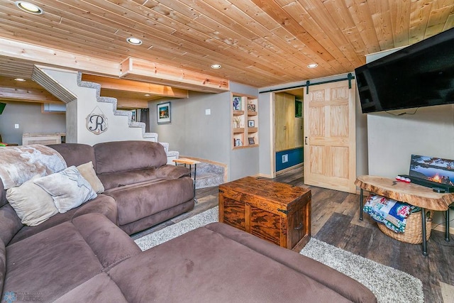 living room featuring dark hardwood / wood-style floors, a barn door, and wooden ceiling