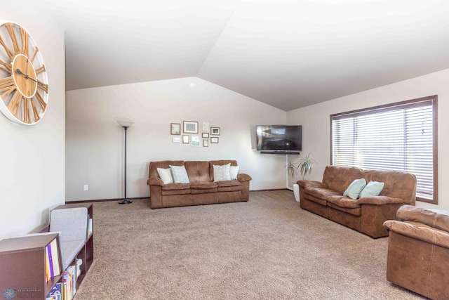 living room featuring light carpet and lofted ceiling