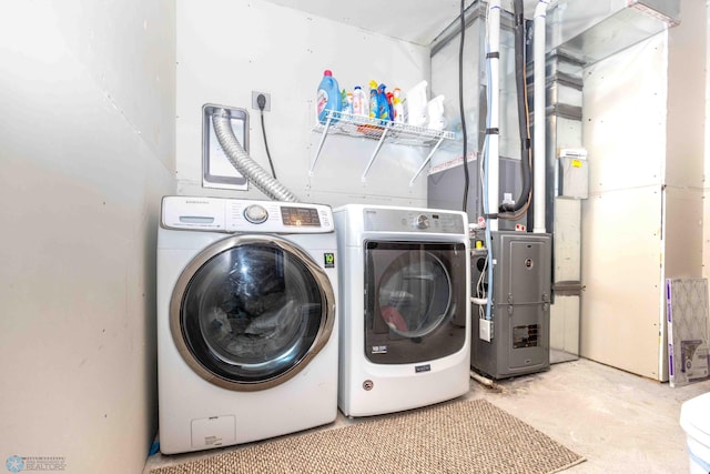 laundry area featuring separate washer and dryer