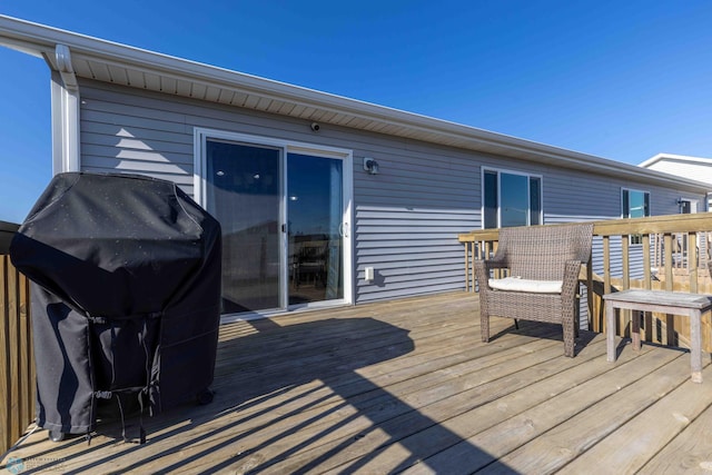 wooden deck featuring grilling area