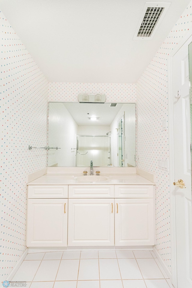 bathroom featuring vanity and tile patterned floors