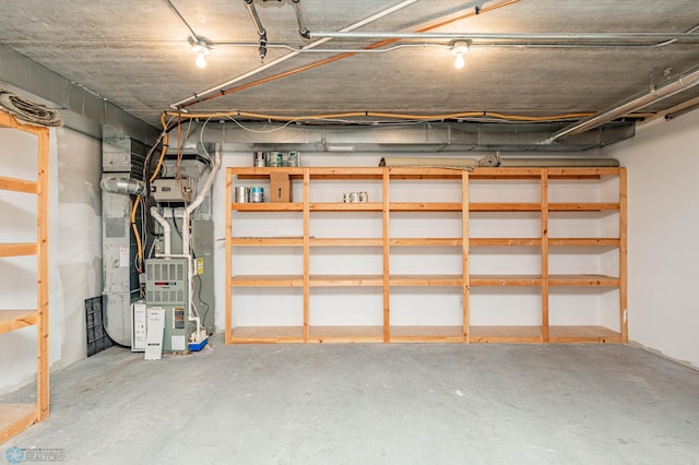 basement featuring heating unit