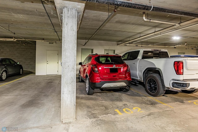 garage featuring a carport