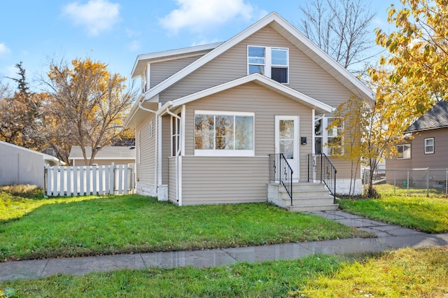 bungalow with a front yard