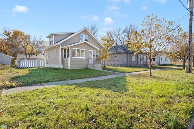 view of front of home featuring a front yard