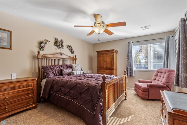 bedroom with light carpet and ceiling fan