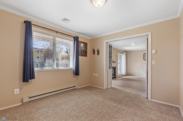 empty room with ornamental molding, a baseboard heating unit, and light carpet